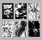 istock Grunge textures set. Abstract hand drawn backgrounds. Graphic elements: brush strokes, dots, spots, stripes, ink splashes. Sketch monochrome vector illustrations isolated on white background. 1482385138