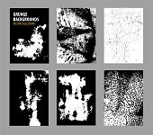 istock Grunge textures set. Abstract hand drawn backgrounds. Graphic elements: brush strokes, spots, ink splashes. Sketch monochrome vector illustrations isolated on white background. 1482385197