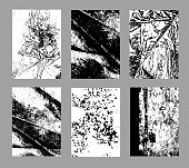 istock Grunge textures set. Abstract hand drawn backgrounds. Graphic elements: brush strokes, dots, spots. Sketch monochrome vector illustrations isolated on white background. 1482385757