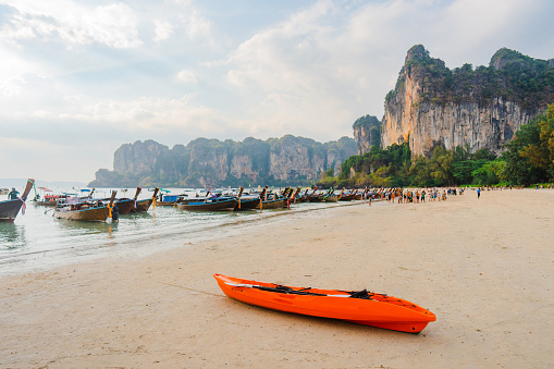 KO PHI PHI, THAILAND, February 2, 2014: Tropical beach with traditional long tail boats on the beach of Bamboo Island, Ko Phi Phi archipelago, Andaman Sea, famous tourist destination in Thailand