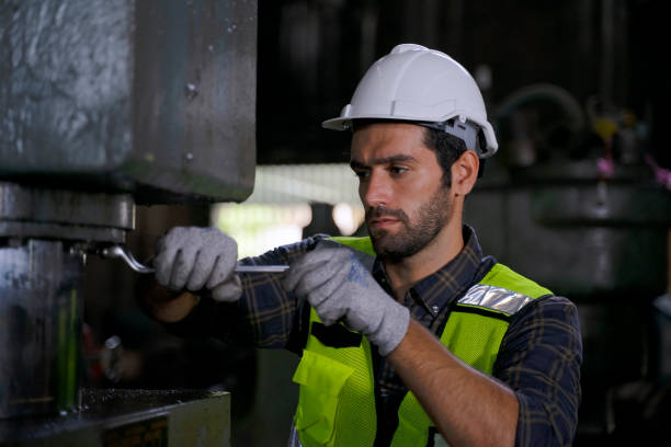 istock Blue collar worker work at machinery factory. 1482385970