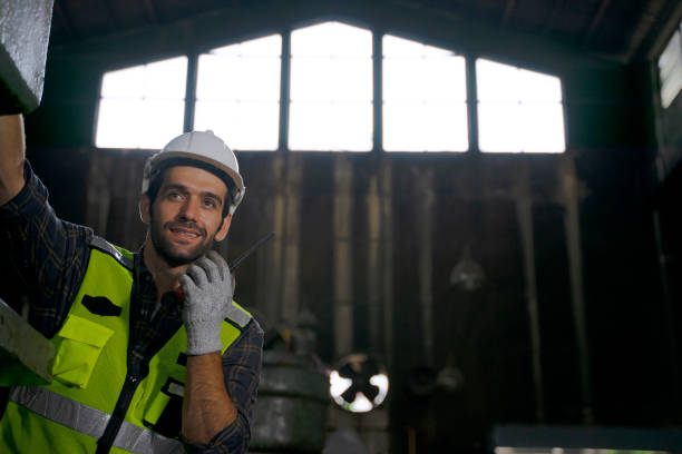 istock Blue collar worker work at machinery factory. 1482385995