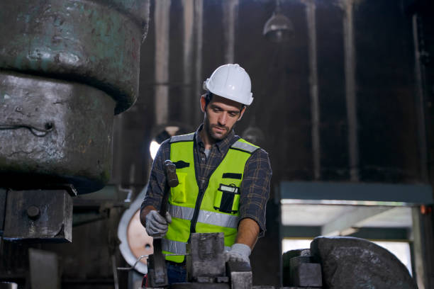 istock Blue collar worker work at machinery factory. 1482386029