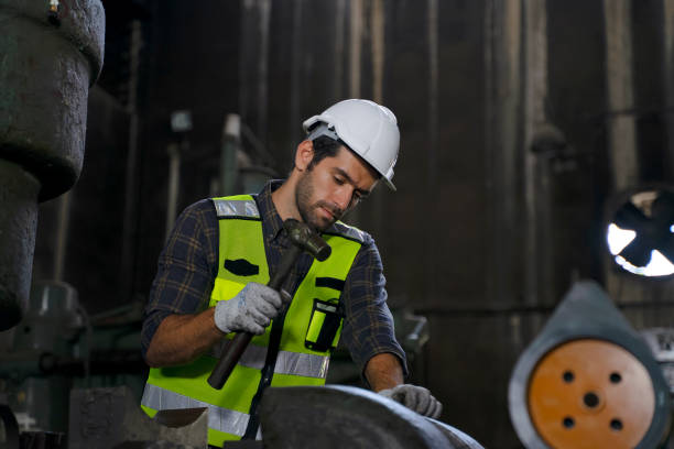 istock Blue collar worker work at machinery factory. 1482386034