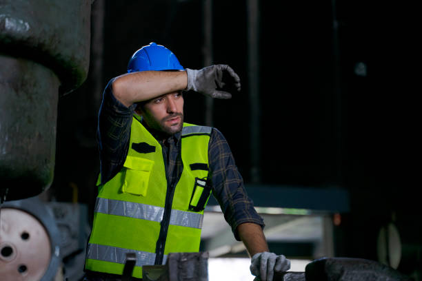 istock Blue collar worker work at machinery factory. 1482386073