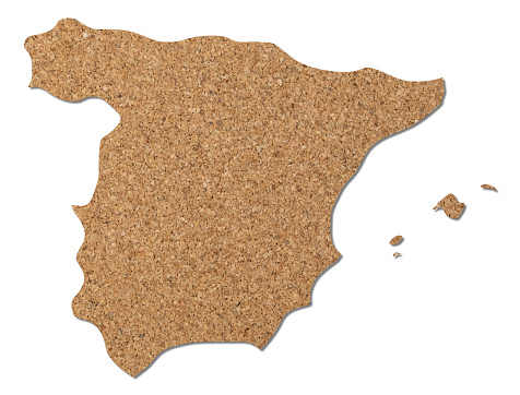 Spain map cork wood texture cut out on white background.