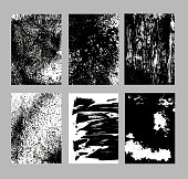 istock Grunge textures set. Abstract hand drawn backgrounds. Graphic elements: brush strokes, spots, ink splashes. Sketch monochrome vector illustrations isolated on white background. 1482390937
