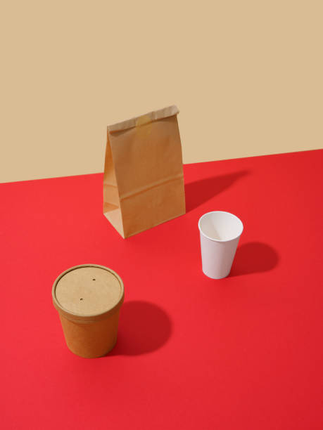 istock Takeaway food packaging: boxes and containers on colorful background with text space. Minimalistic concept 1482391325