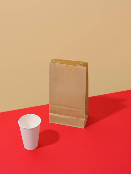 istock Takeaway food packaging: boxes and containers on colorful background with text space. Minimalistic concept 1482391327
