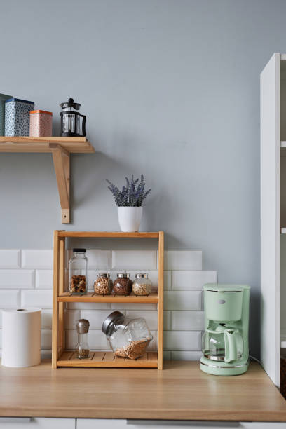 istock Kitchen design wooden shelf with spices herbs on kitchen counter 1482392217