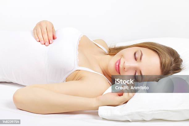 Sleeping Girl On The Bed Stock Photo - Download Image Now - Sleeping, Only Women, Pillow