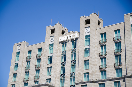 Facade of hotel downtown Quebec city during springtime day