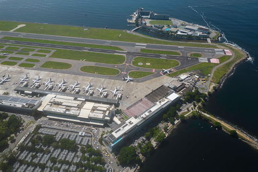 Vancouver, British Columbia - July 25, 2023: The view of Coal Harbour seaside park and Harbour Air Seaplanes, Vancouver, Canada.