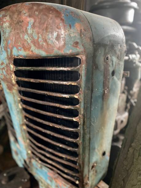 istock Old rusty blue tractor grill. Retro farming equipment. 1482401944