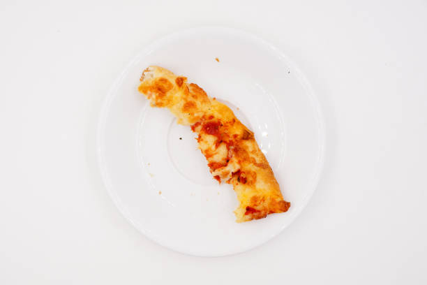 Leftover pizza crust that some people may not eat