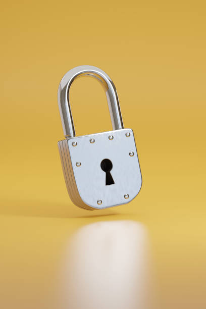 istock Closed padlock isolated on yellow background. 3d illustration. 1482404300