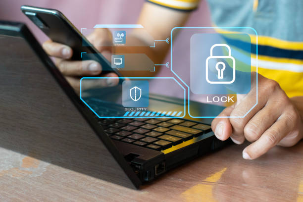 istock Hand pointing lock icon, privacy protection concept, mobile phone, smartphone and computer. 1482404902