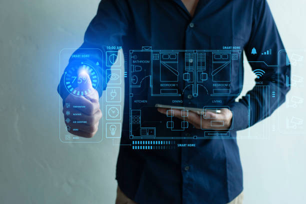 istock Smart home technology on a smartphone app screen with an augmented reality (AR) view of the Internet of Things (IOT).Home technology of the future. 1482404905