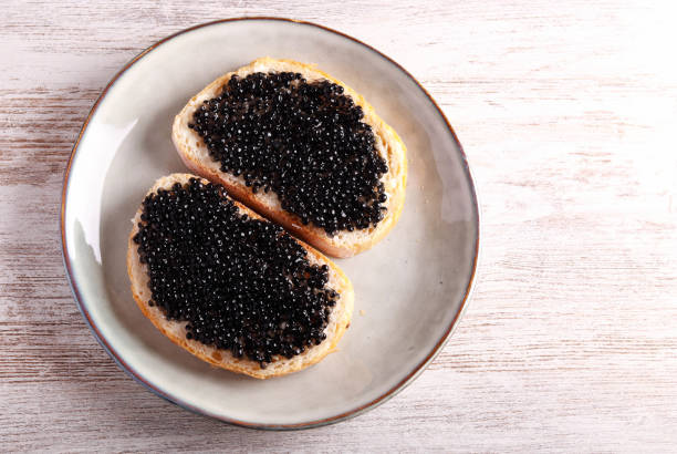 istock Black caviar over slices of  bread 1482406031