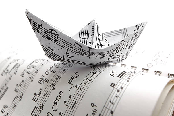sheet music paper boat - noter isolated on white bildbanksfoton och bilder