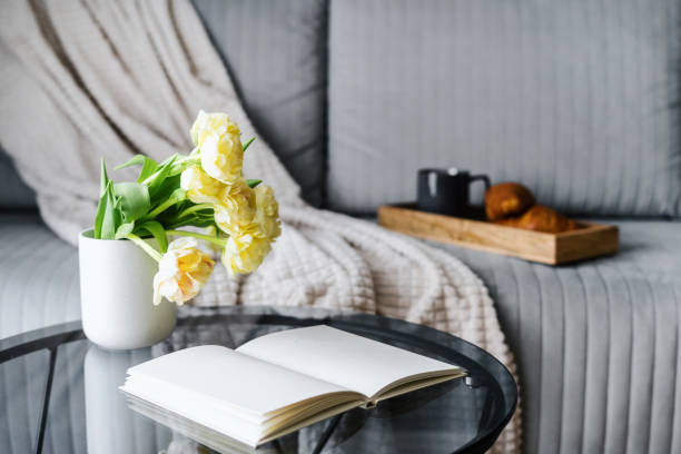 istock side table with empty notebook in living room with hygge style 1482407016