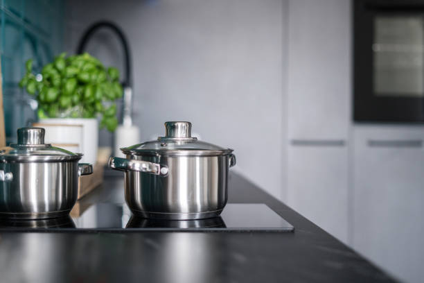 istock cooking pot on electrical hob at home kitchen, closeup 1482407046