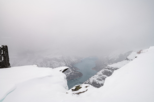 Lake Ringedalsvatnet in western Norway as viewed at the Trolltunga formation on a snowy, winter day.