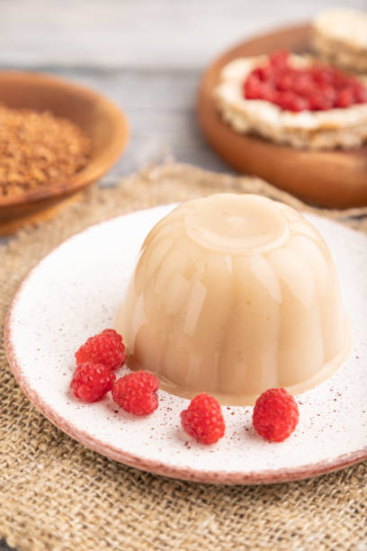 istock Buckwheat milk jelly on gray wooden, side view, selective focus. 1482414083