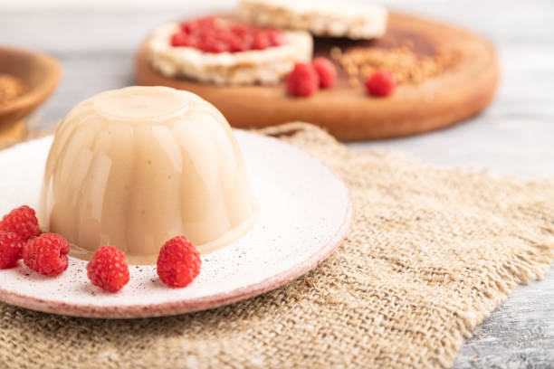 istock Buckwheat milk jelly on gray wooden, side view, selective focus. 1482414084