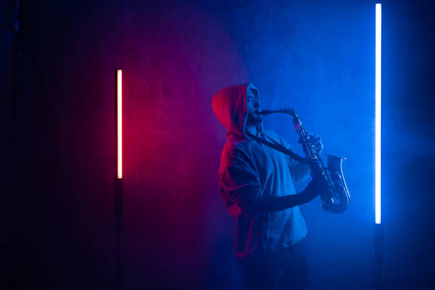 istock Male saxophonist playing 1482418760