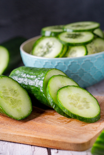 Fresh cucumber and slices