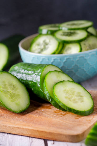 Fresh cucumber Fresh cucumber and slices chopped dill stock pictures, royalty-free photos & images