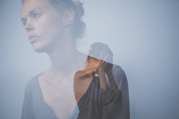 istock Depressed, anxious young woman suffering from mental disorders 1482421510