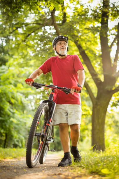 istock Senior man with his mountain bike 1482421606