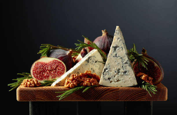 istock Blue cheese with figs, walnuts, and rosemary. 1482423536