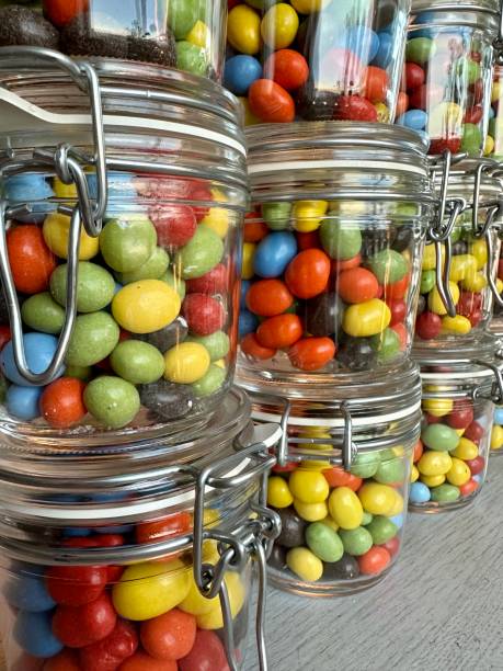 istock Colorful candy in glas jars at a candy store 1482428058