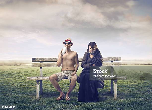 Man And Woman On Park Bench Stock Photo - Download Image Now - Summer, Winter, Clothing