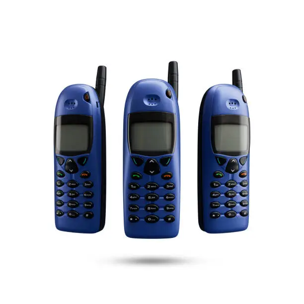 Nokia 6110 Mobile phone from 1997. This is an old vintage and retro mobile phone. A blue cell phone with a black antenna on the top.