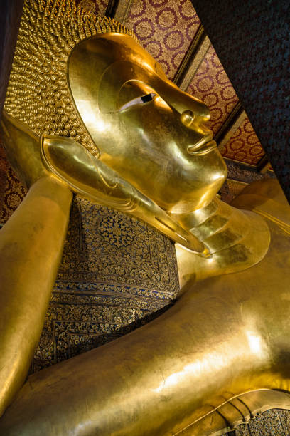 istock Reclining Buddha gold statue. Wat Pho, Bangkok. 1482434587