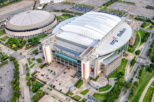 Nashville, USA - A view of the Nissan Stadium, close to downtown Nashville, illuminated at dusk.