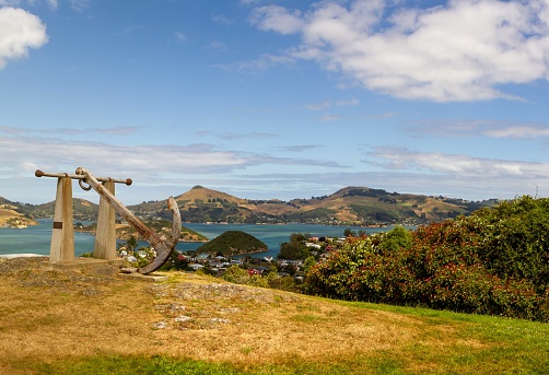 Monument on Centenary Lookout overlooking the harbor in Port Chalmers, New Zealand.