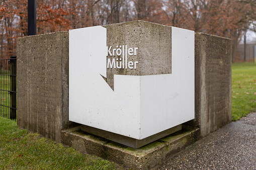 Otterlo, Netherlands – August 20, 2022: Art musem entrance stone with the name and logo of the Hoge Veluwe park venue
