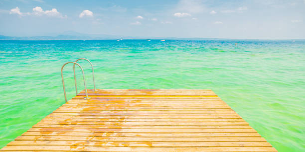 beach holiday. garda lake. italy. europe. summer journey - textured nature hurricane caribbean sea imagens e fotografias de stock