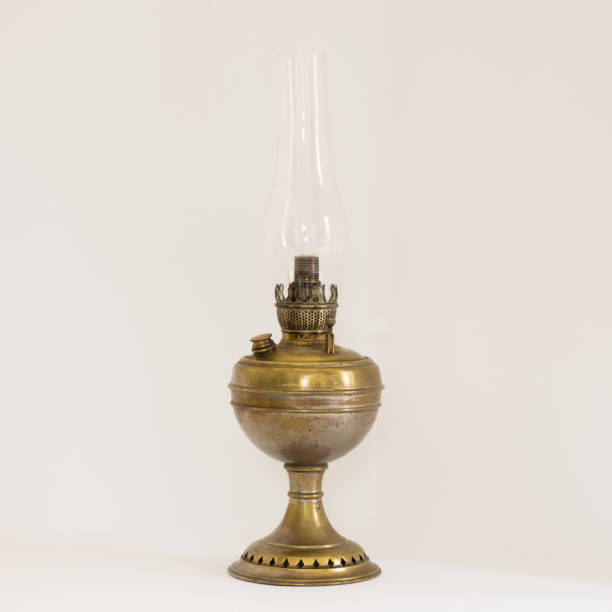istock Antique brass oil lamp isolated on white background 1482453112