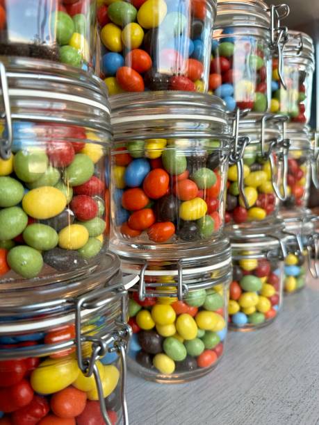 istock Colorful candy in glas jars at a candy store 1482462270