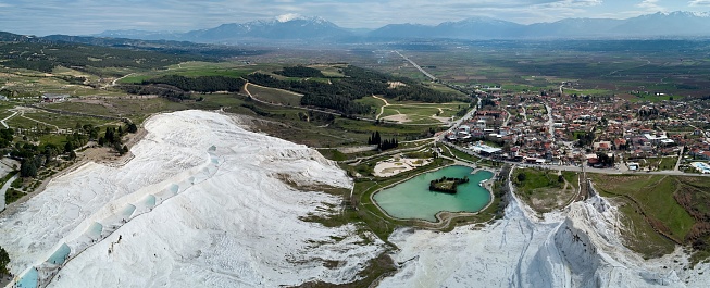 An aerial perspective of the idyllic landscape surrounding the Pamukkale Thermal Pools in Turkey