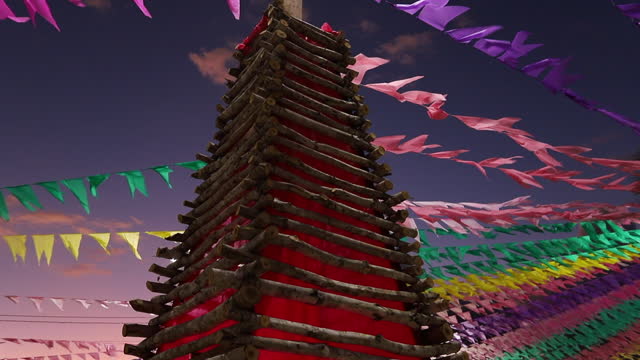 decorative bonfire and colorful flags of festa junina in brazil