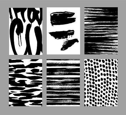 istock Grunge textures set. Abstract graffiti backgrounds. Brush strokes, spots, scratches, stripes, dots. Sketch monochrome vector illustrations isolated on a white background. 1482473526