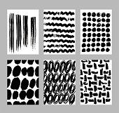 istock Grunge textures set. Abstract graffiti backgrounds. Brush strokes, spots, scratches, stripes, dots. Sketch monochrome vector illustrations isolated on a white background. 1482473561