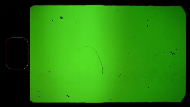 Vintage Super 8 mm Film Frame Texture on Green Screen with Sprocket Hole and Noise, Dust, Hair, Scratches. Old Damaged Shaky Film Retro Look Effect. 4k resolution. Chroma key.